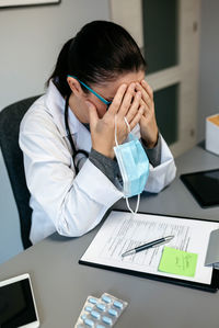Close-up of man working in office