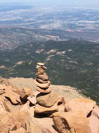 High angle view of rocks on mountain against sky