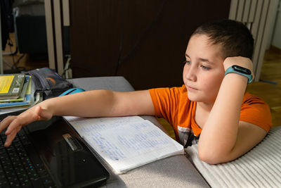 Boy studying at home