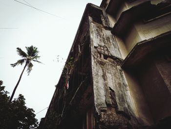 Low angle view of old building against sky