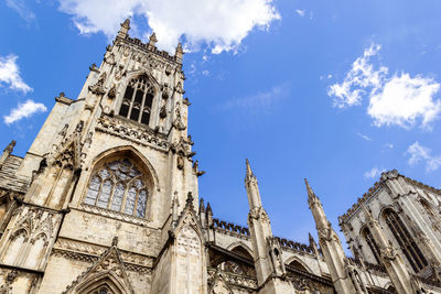 Low angle view of york minster against sky