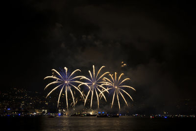 Firework display at night