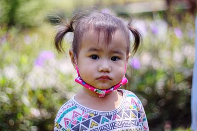 Cute asian toddler big eyes, looking camera  headshot close up view, the portrait children 