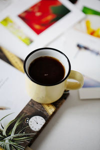 High angle view of coffee cup on table