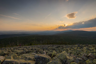 Scenic view of landscape against sky during sunset