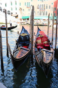 Boats moored in canal