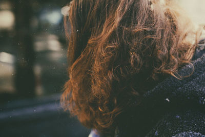 Rear view of woman in snow