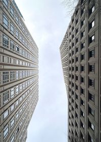 Low angle view of modern buildings against sky