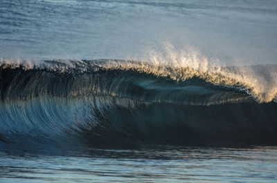 Sea waves splashing on shore