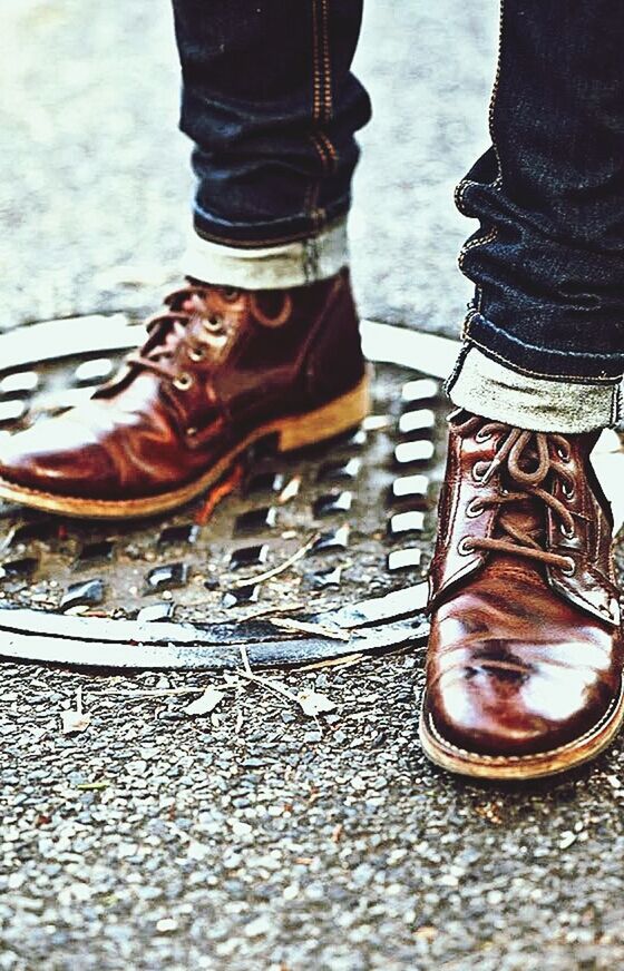 low section, person, shoe, part of, close-up, men, footwear, standing, lifestyles, human foot, personal perspective, focus on foreground, unrecognizable person, jeans, leisure activity, selective focus