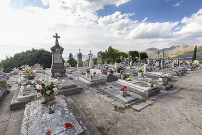 Panoramic view of cemetery against sky