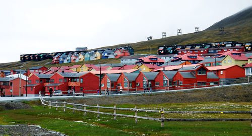 Graffiti on building against clear sky in city