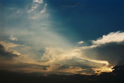 Low angle view of dramatic sky during sunset