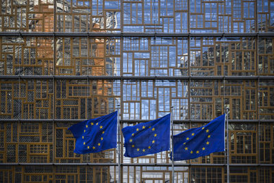 Low angle view of european flags in brussels