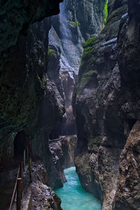 Scenic view of waterfall in sea