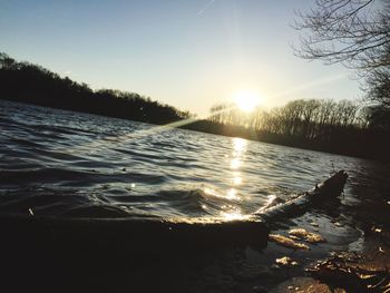 Scenic view of calm lake against sky