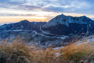 Scenic view of mountains against sky during sunset