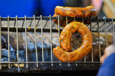 Close-up of meat on barbecue grill