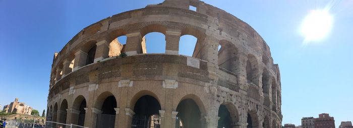 Low angle view of the coliseum in rome italy against sky