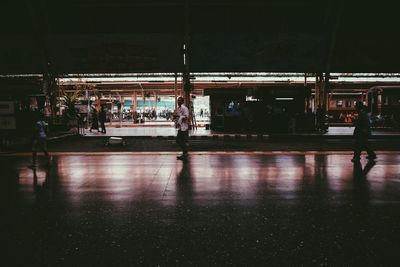 Group of people at railroad station platform