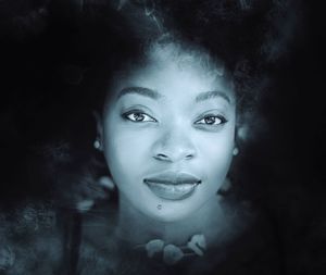 Digital composite image of young woman against black background