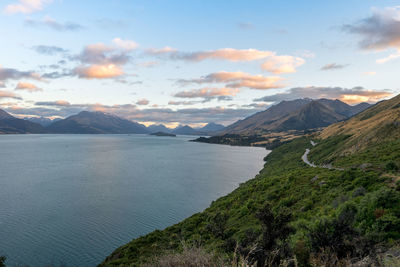 Scenic view of lake against sky during sunset