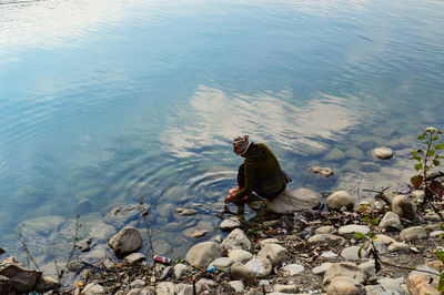  woman sitting in water