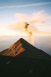 Scenic view of mountains against sky during sunrise 