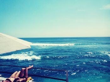 Scenic shot of sea against blue sky