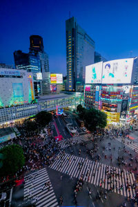 High angle view of people crossing road