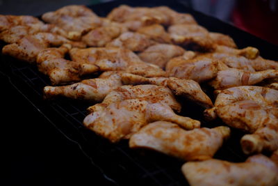 Close-up of meat on barbecue grill