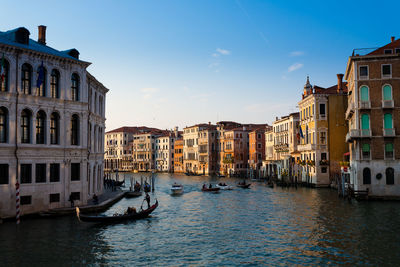 Canal passing through city buildings