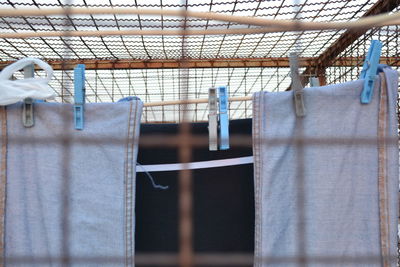 Low angle view of clothes drying against building
