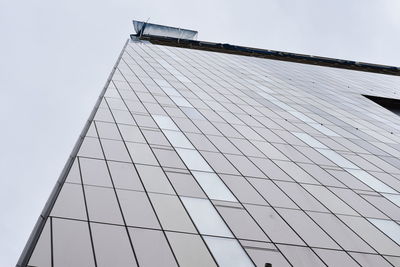 Low angle view of modern building against clear sky