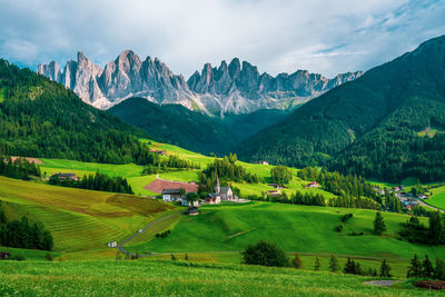 Panoramic view of the church of st. magdalena in the dolomites, italy.