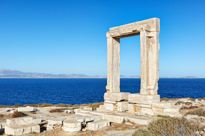 Scenic view of sea against blue sky