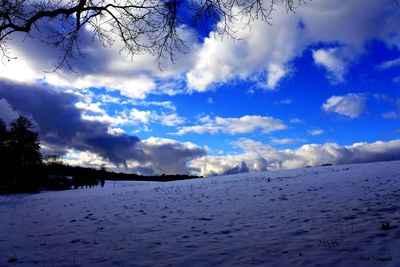 Scenic view of sea against sky during winter