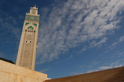 Low angle view of clock tower against sky