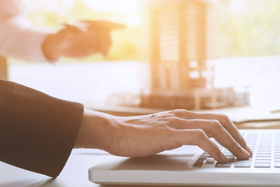 Man using laptop on table