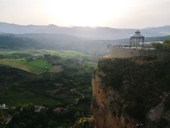 Gazebo on cliff during sunset