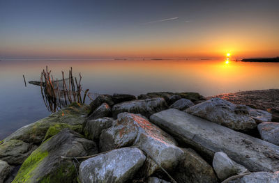 Scenic view of sea against sky during sunset