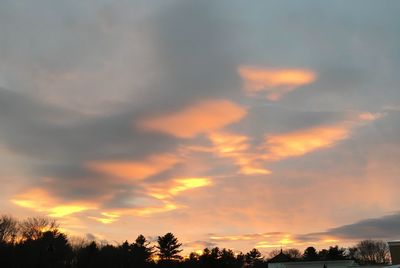 Low angle view of cloudy sky during sunset