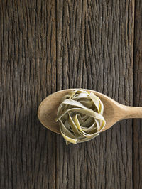 High angle view of tagliatelle pasta on table