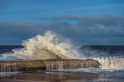 Waves splashing on rocks