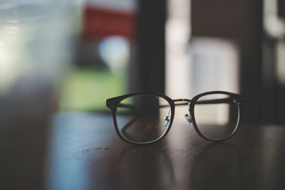 Close-up of sunglasses on table