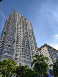 Low angle view of modern building against sky