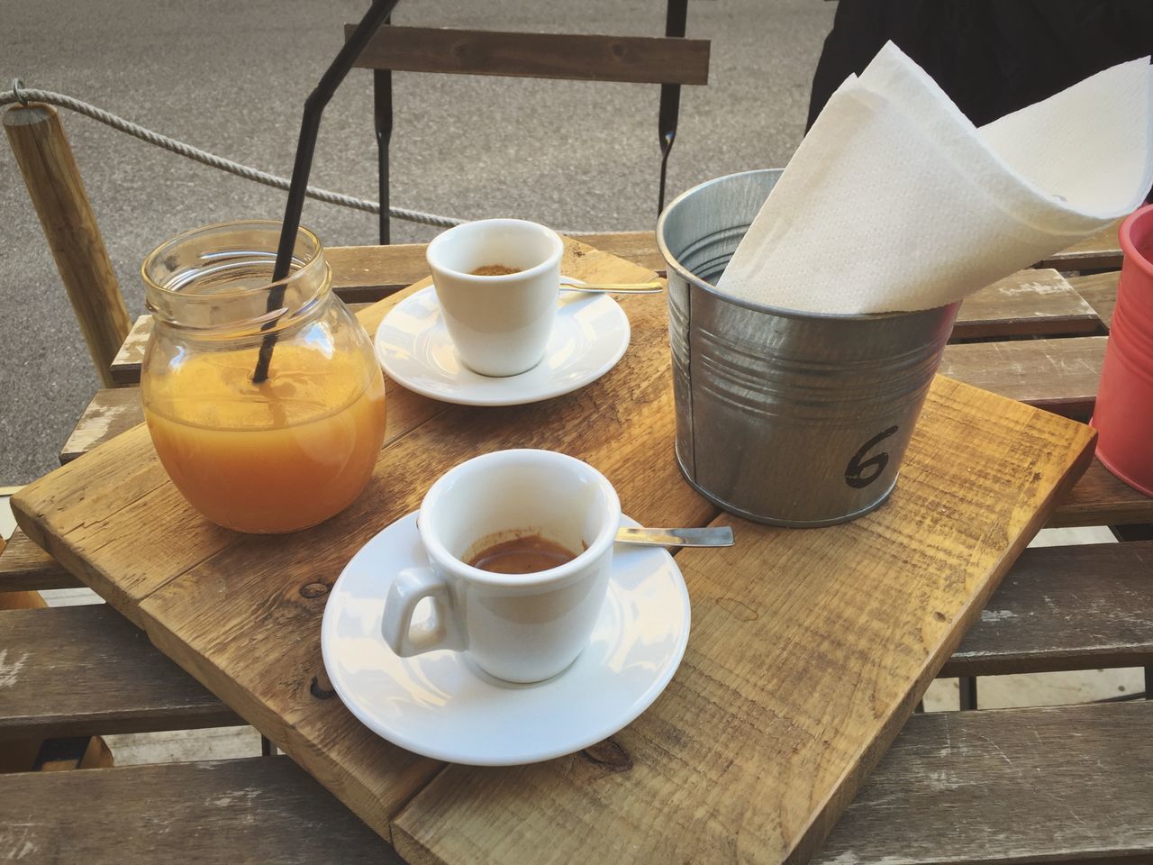 drink, food and drink, refreshment, table, freshness, coffee cup, coffee - drink, saucer, indoors, drinking glass, still life, spoon, high angle view, frothy drink, coffee, healthy eating, cup, beverage, close-up, cafe