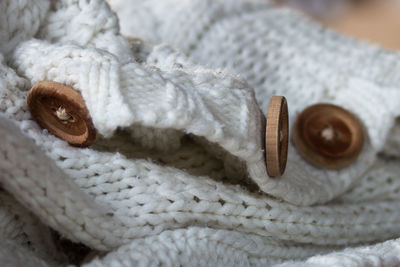 Close-up of spoon on wood