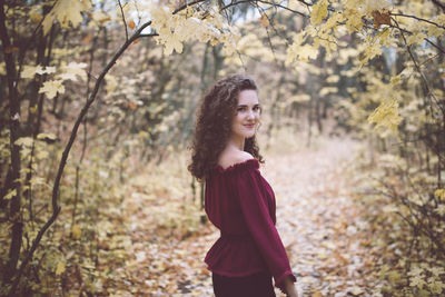 Girl in a top in an atumn park