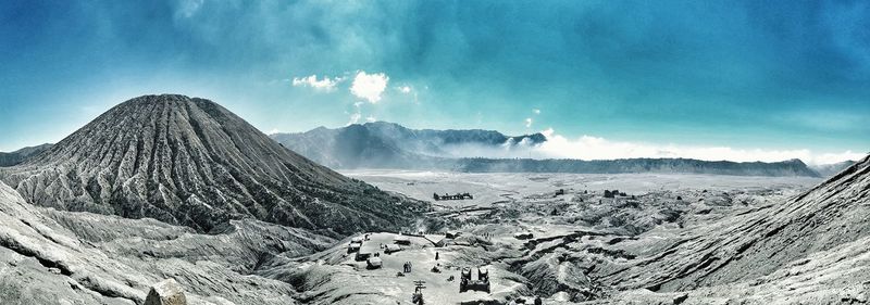 Volcanic landscape against blue sky